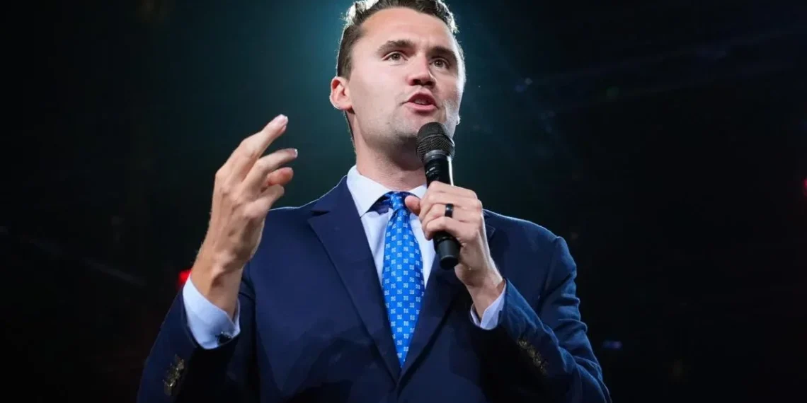 Charlie Kirk speaking at a public event before an audience during his career as a political activist and media personality.